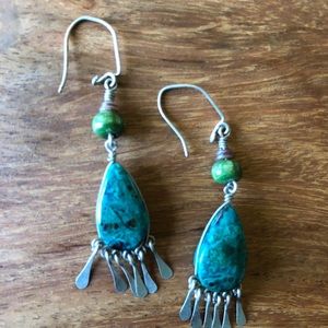 Green stone dangle earrings.